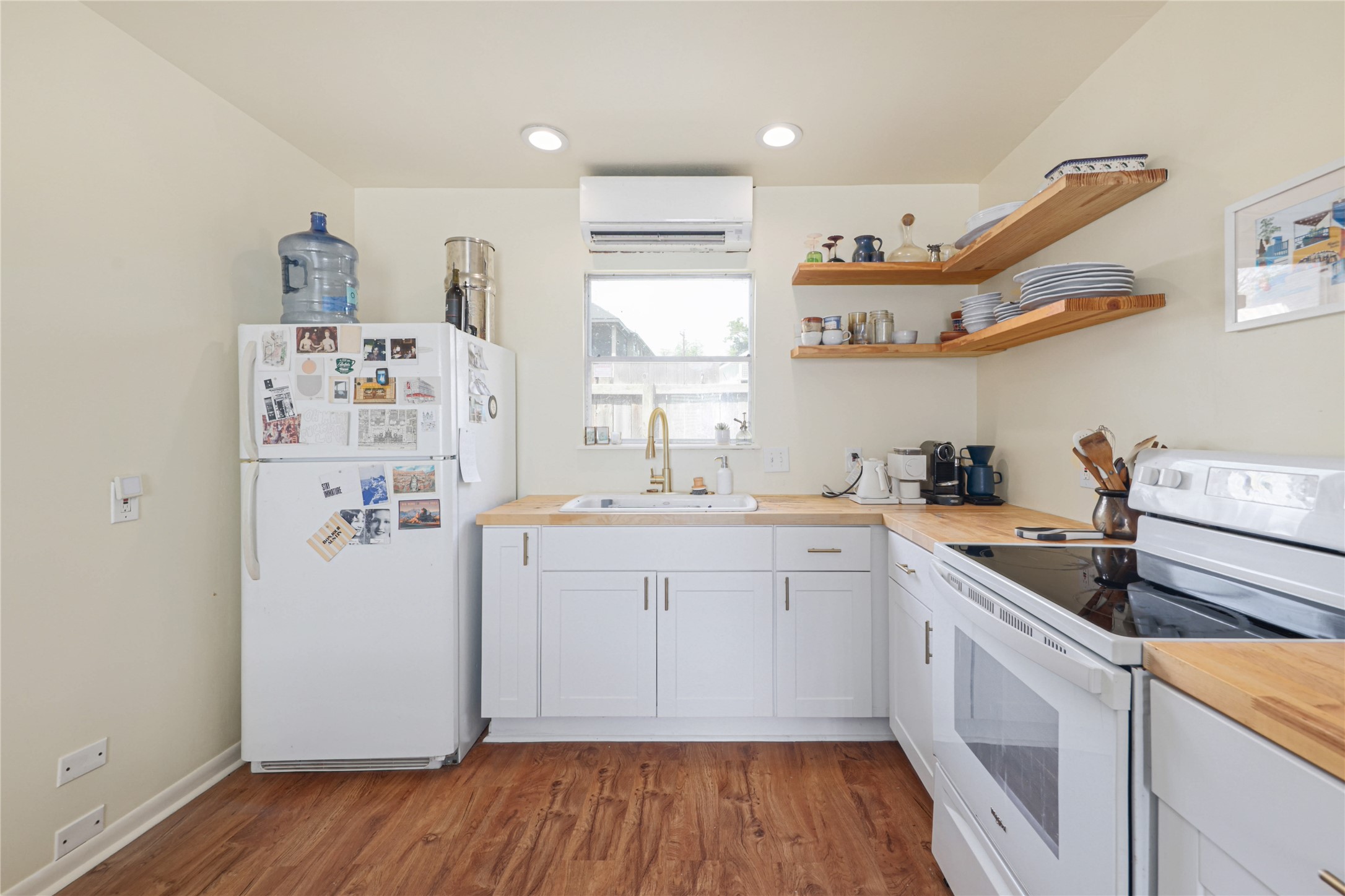 4607 Evans Avenue, Unit B Austin, TX 78751 - Photo 18 of 34 Kitchen featuring wood-finish flooring and light-toned walls