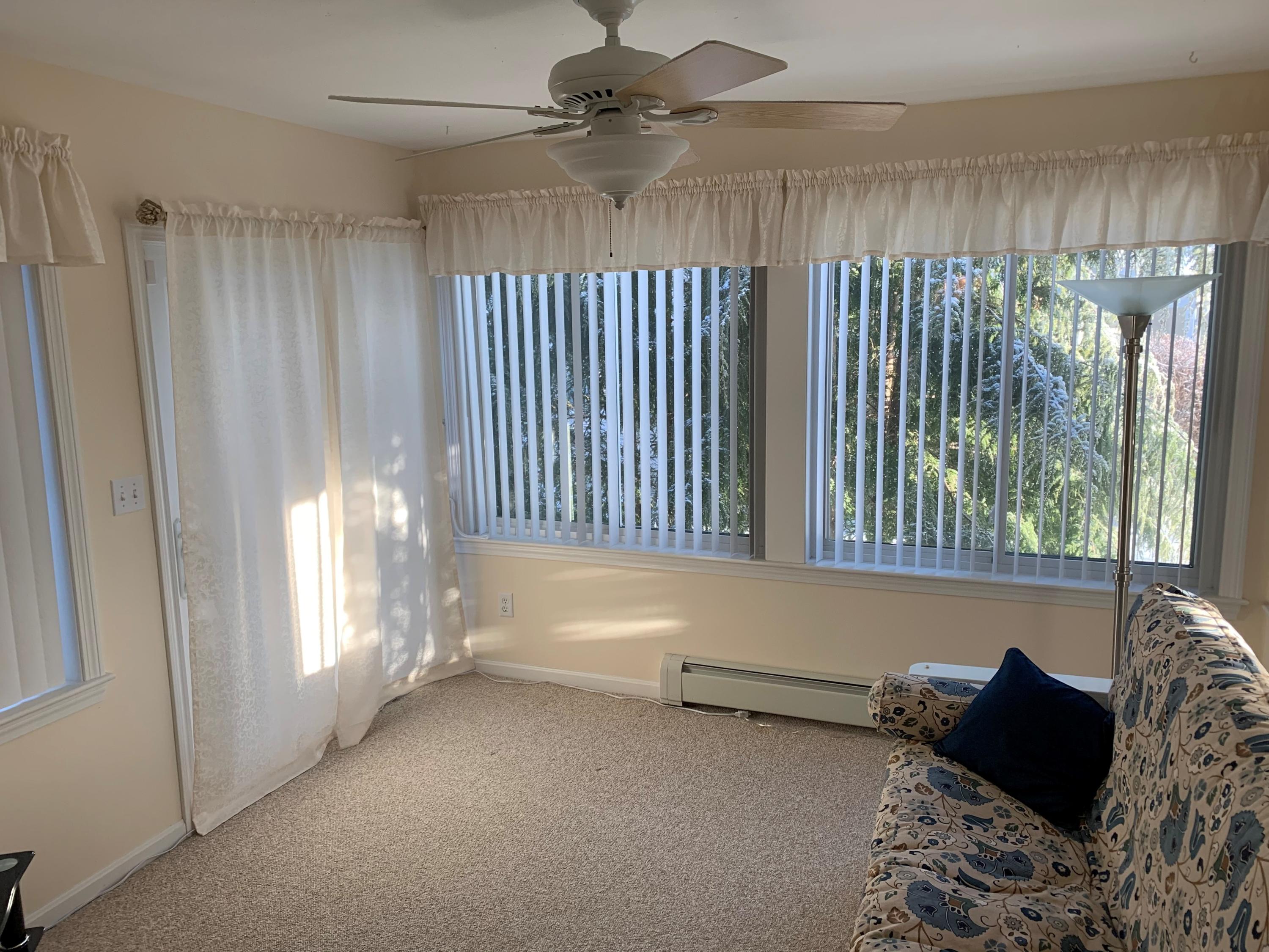 149 Spinnaker Ridge Drive, Unit 45 Wells, ME 04090 - Photo 13 of 27 Bright and airy sunroom.
