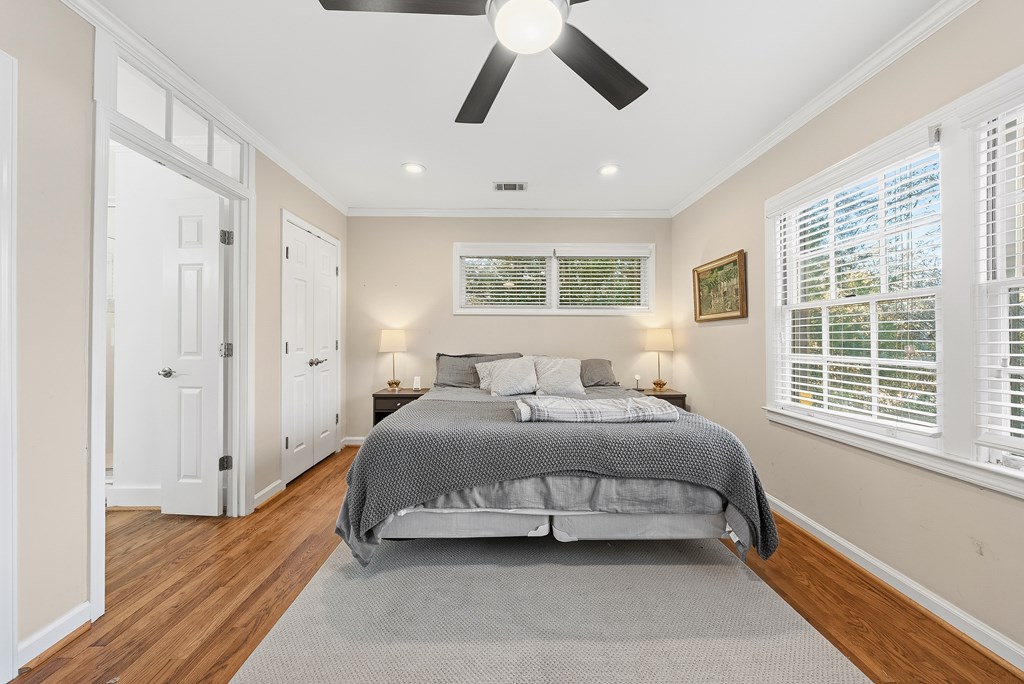 3704 East Britt David Road Columbus, GA 31909 - Photo 20 of 40 a bedroom with a bed and a window