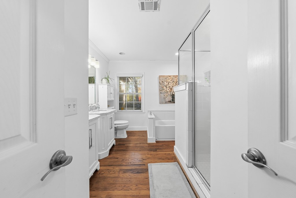 3704 East Britt David Road Columbus, GA 31909 - Photo 22 of 40 a large white room with shower