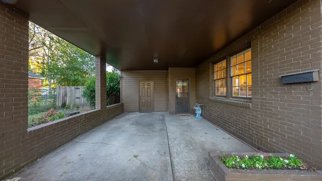 a view of a room with a large window