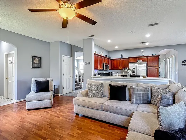 a bedroom with furniture and a window