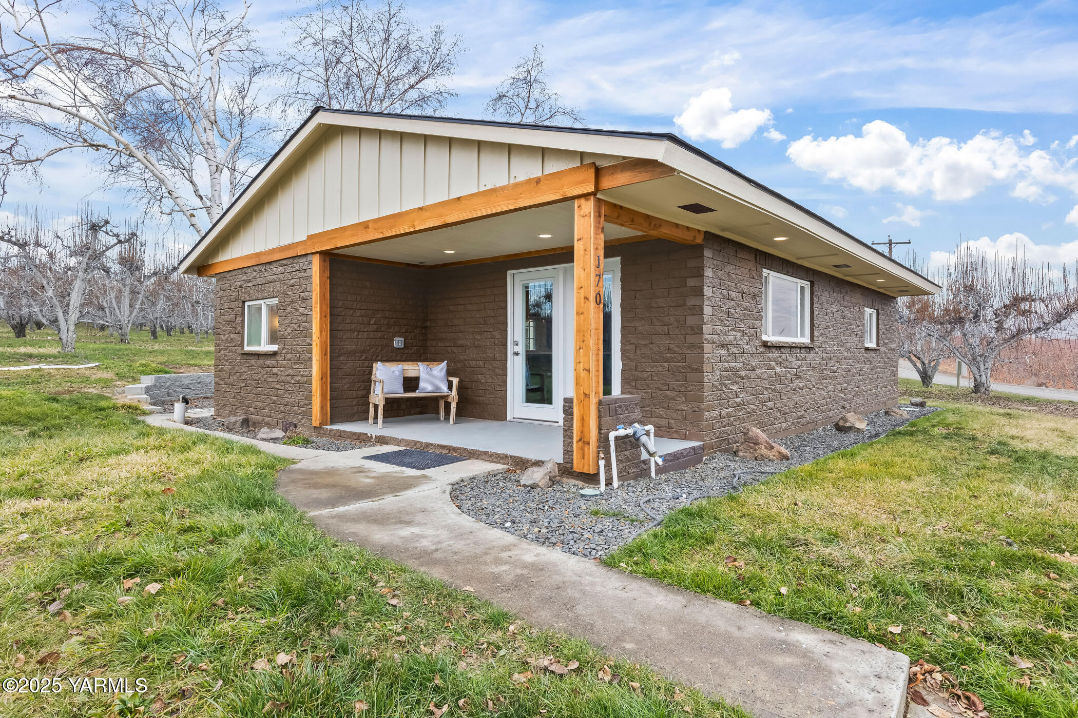 170 Brooks Road Wapato, WA 98951 - Photo 1 of 20 a front view of a house with a yard