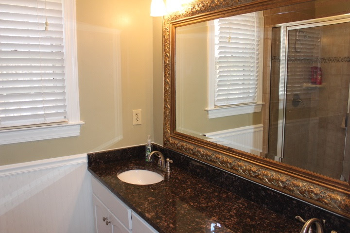 2205 Millpine Drive Raleigh, NC 27614 - Photo 13 of 22 Updated master bath with granite counter tops, updated tile floors and shower. Master Bath