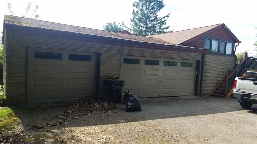 308 Pine Road Pittsburgh, PA 15237 - Photo 3 of 20 Three car garage with plenty of additional parking spaces for guests!