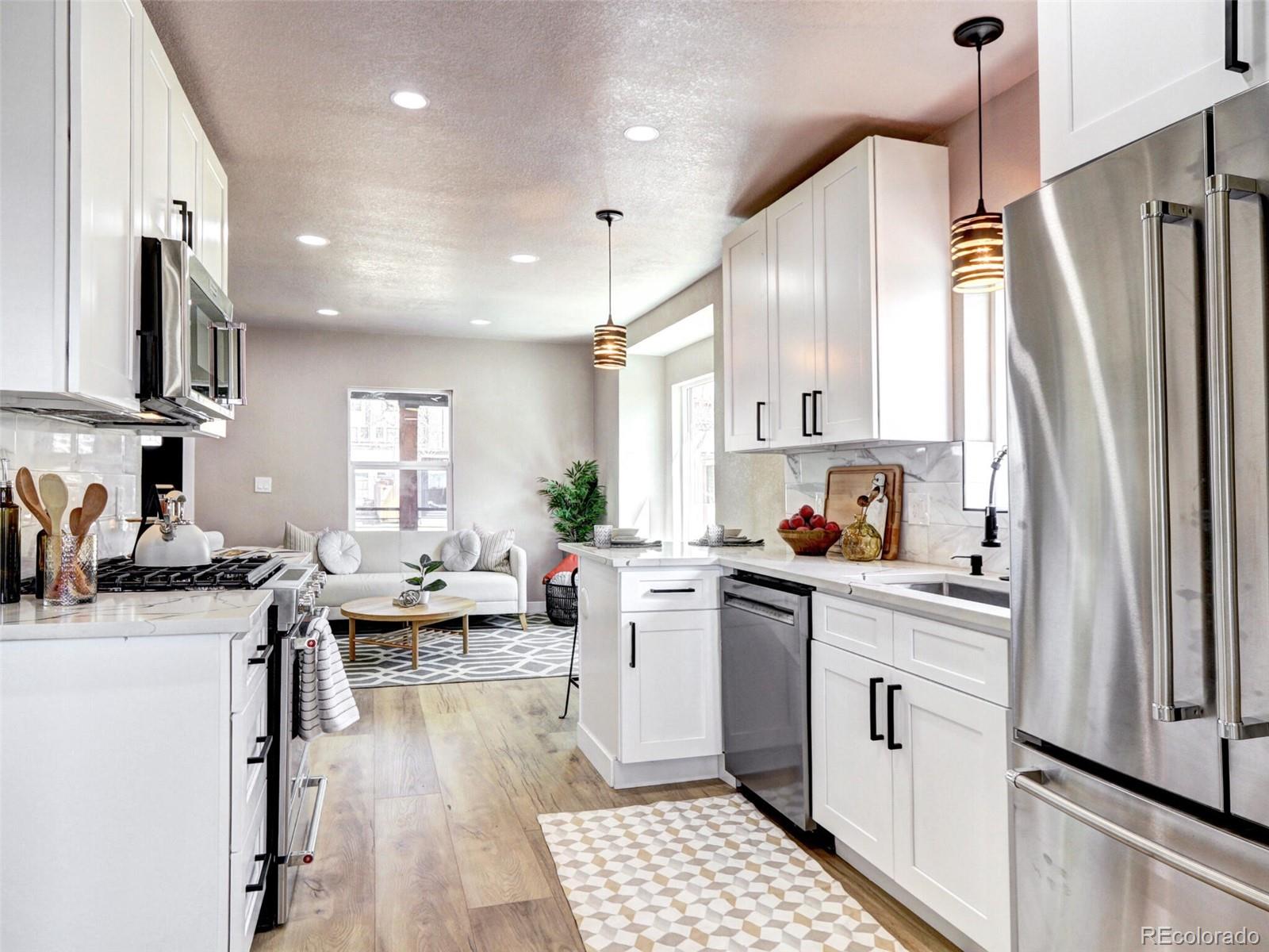 2525 South Lincoln Street Denver, CO 80210 - Photo 14 of 38 a kitchen with white cabinets and appliances