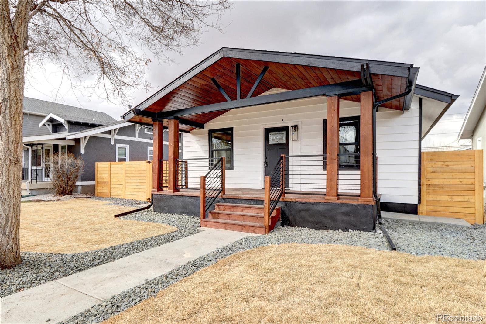 2525 South Lincoln Street Denver, CO 80210 - Photo 2 of 38 a front view of a house