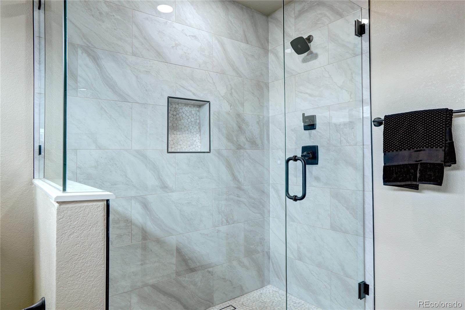 2525 South Lincoln Street Denver, CO 80210 - Photo 21 of 38 a bathroom with a shower
