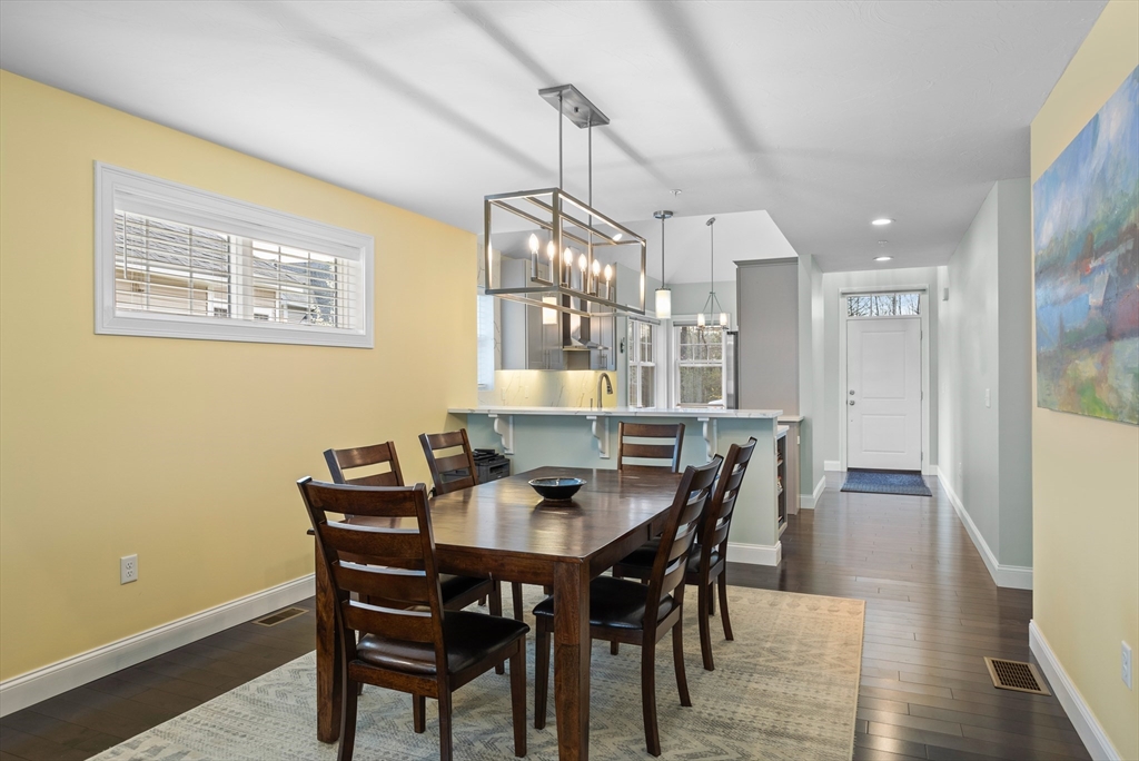 12 Trail Ridge Way, Unit A Harvard, MA 01451 - Photo 13 of 31 a view of a dining room with furniture and wooden floor