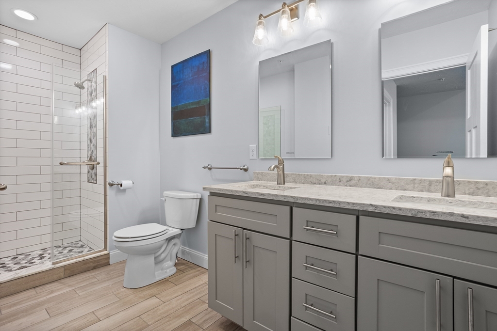12 Trail Ridge Way, Unit A Harvard, MA 01451 - Photo 19 of 31 a bathroom with a sink toilet and shower
