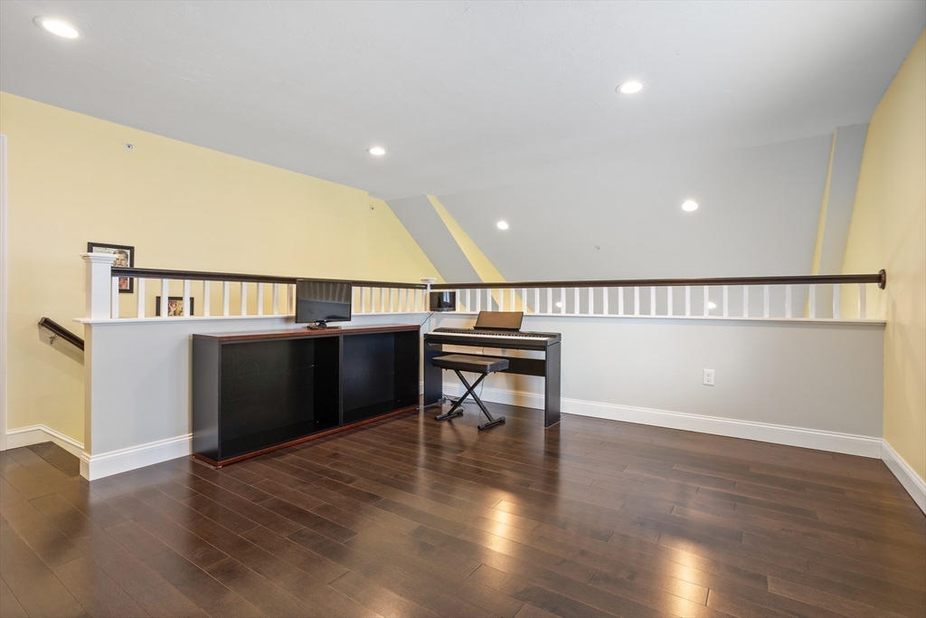 12 Trail Ridge Way, Unit A Harvard, MA 01451 - Photo 21 of 31 a view of a hallway with wooden floor