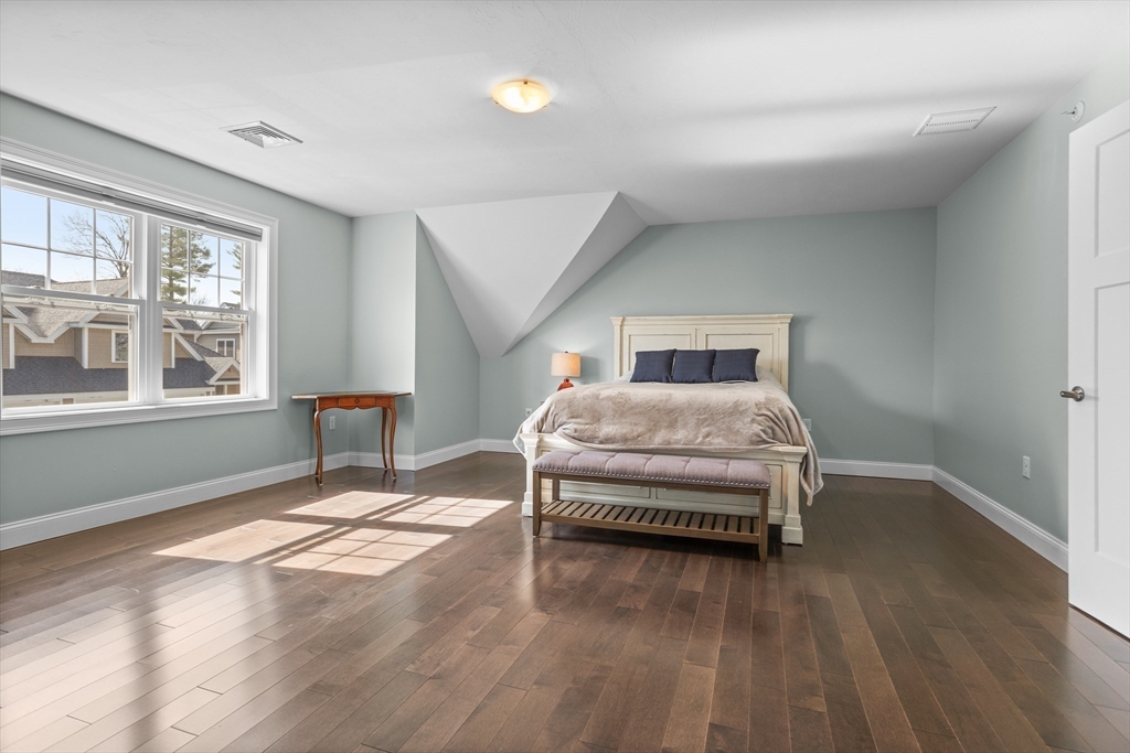 12 Trail Ridge Way, Unit A Harvard, MA 01451 - Photo 24 of 31 a bedroom with a bed and a window