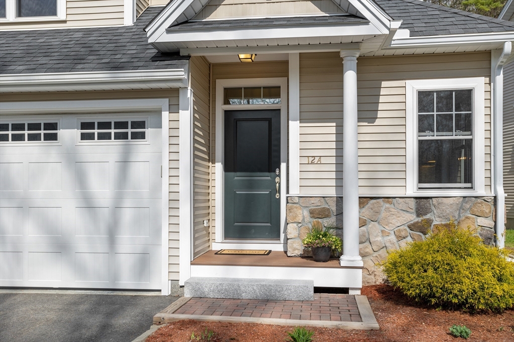 12 Trail Ridge Way, Unit A Harvard, MA 01451 - Photo 3 of 31 a front view of a house with a yard