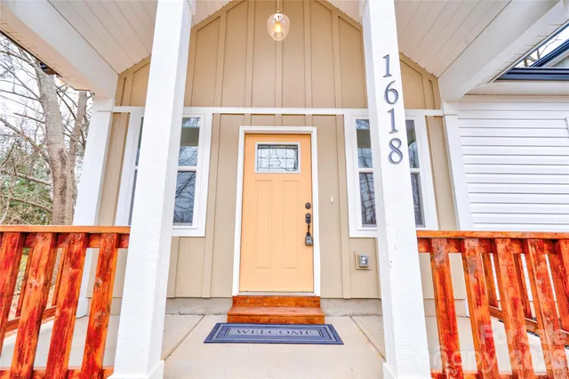a view of an entryway with a door