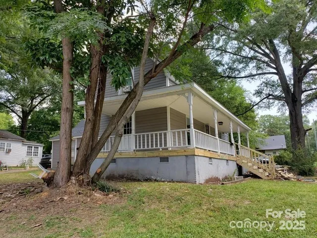 a house with trees in front of it