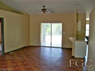 7224 Coolidge Road Fort Myers, FL 33967 - Photo 3 of 10 a view of an empty room with a window