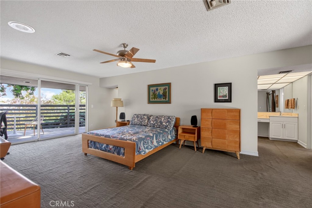 11517 Tulane Avenue Riverside, CA 92507 - Photo 25 of 75 Master wing with personal patios/balcony and right behind this wall is the closet corridor