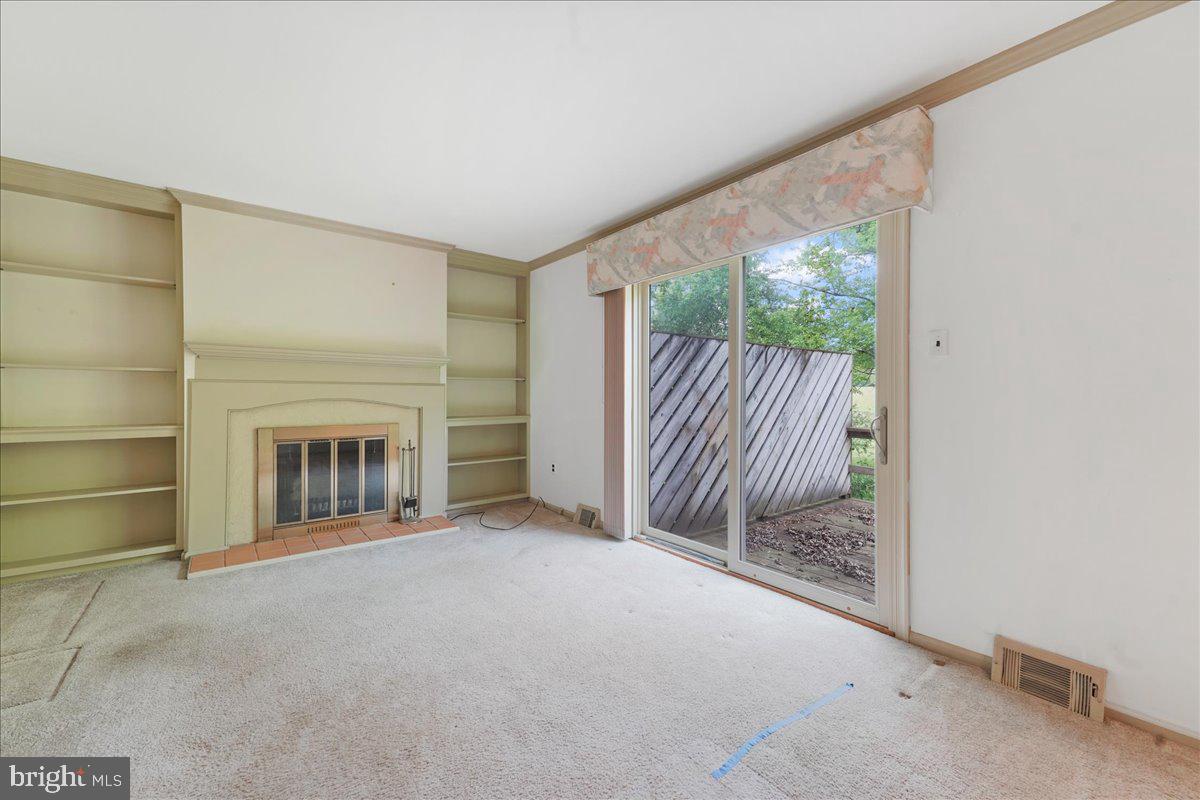 707 Beversrede Trail Kennett Square, PA 19348 - Photo 18 of 37 Family room with fireplace