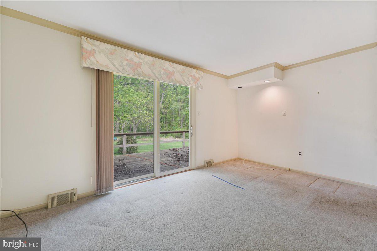 707 Beversrede Trail Kennett Square, PA 19348 - Photo 20 of 37 Family room with slider to back yard