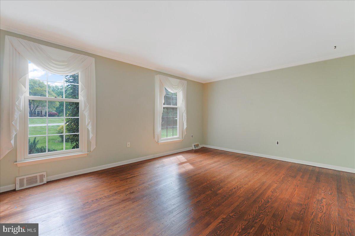 707 Beversrede Trail Kennett Square, PA 19348 - Photo 3 of 37 Living room with beautiful hardwood floors