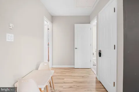 a view of a bedroom from the hallway