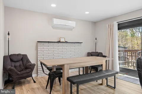 a view of a livingroom with furniture and window