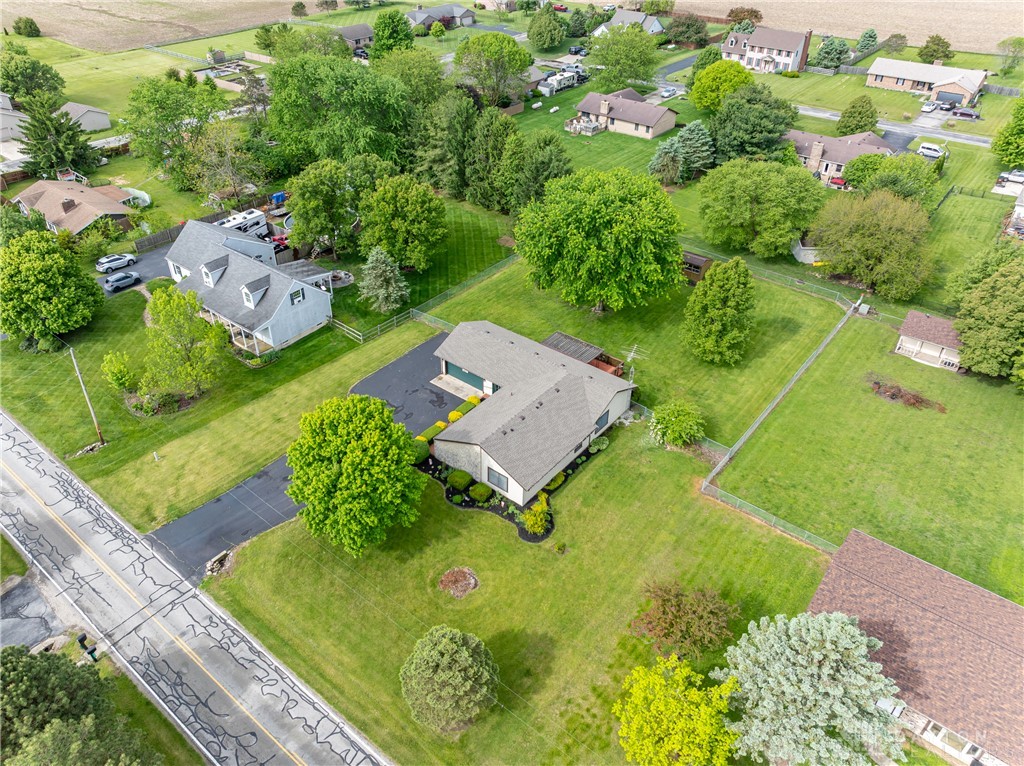 5709 Preble County Line Road Lewisburg, OH 45338 - Photo 36 of 47 An aerial perspective showcases a charming residence nestled amidst a verdant landscape.