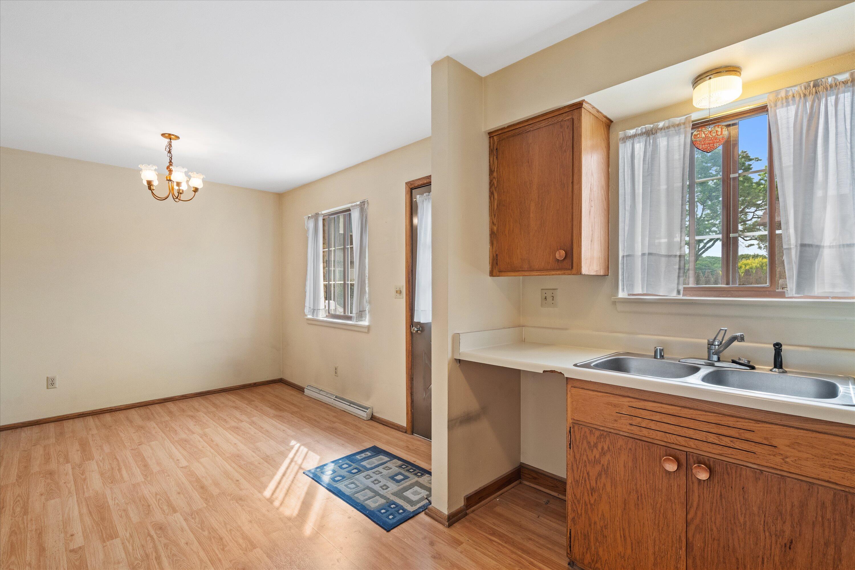 9903 Beloit Road, Unit F10 Milwaukee, WI 53227 - Photo 12 of 30 12-Large Kitchen w_eat in area