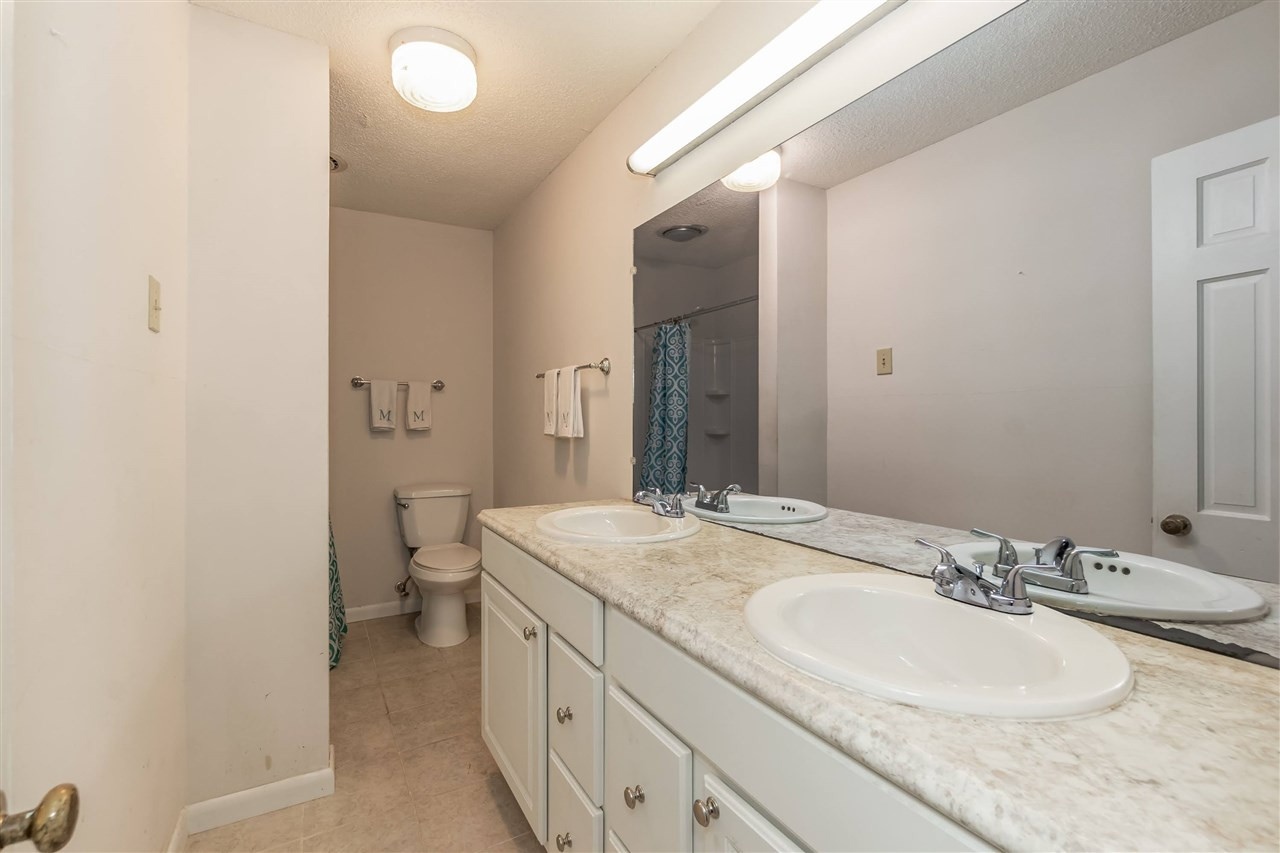 323 Golf Course Drive Raleigh, NC 27610 - Photo 21 of 30 HALLWAY BATHROOM