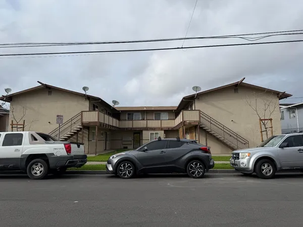 a view of a cars parked in garage