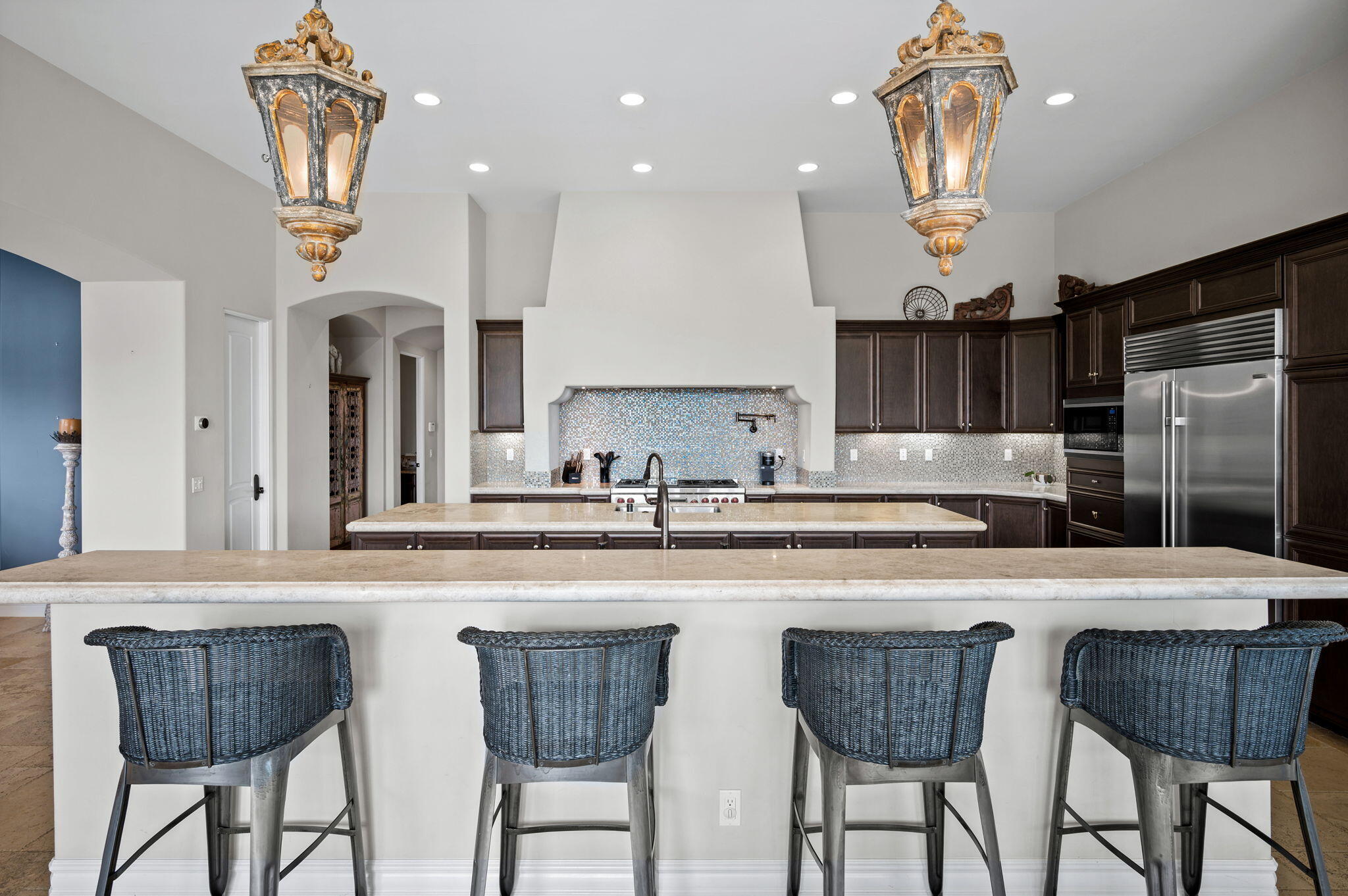 54360 Alysheba Drive La Quinta, CA 92253 - Photo 13 of 68 a kitchen with stainless steel appliances a sink stove and refrigerator