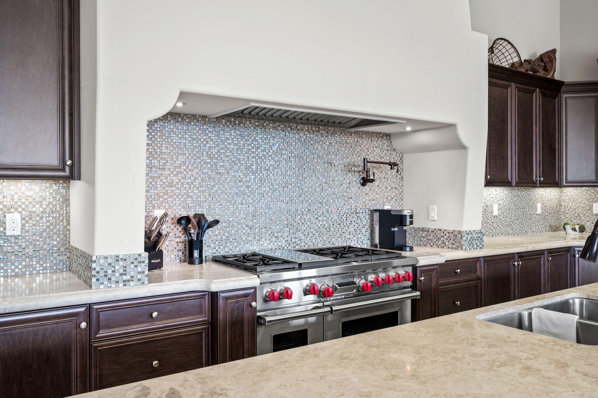 54360 Alysheba Drive La Quinta, CA 92253 - Photo 17 of 68 a kitchen with a stove and a sink