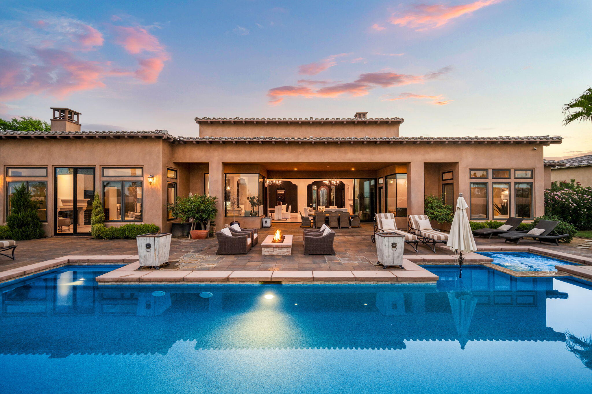 54360 Alysheba Drive La Quinta, CA 92253 - Photo 2 of 68 a view of a swimming pool with outdoor seating