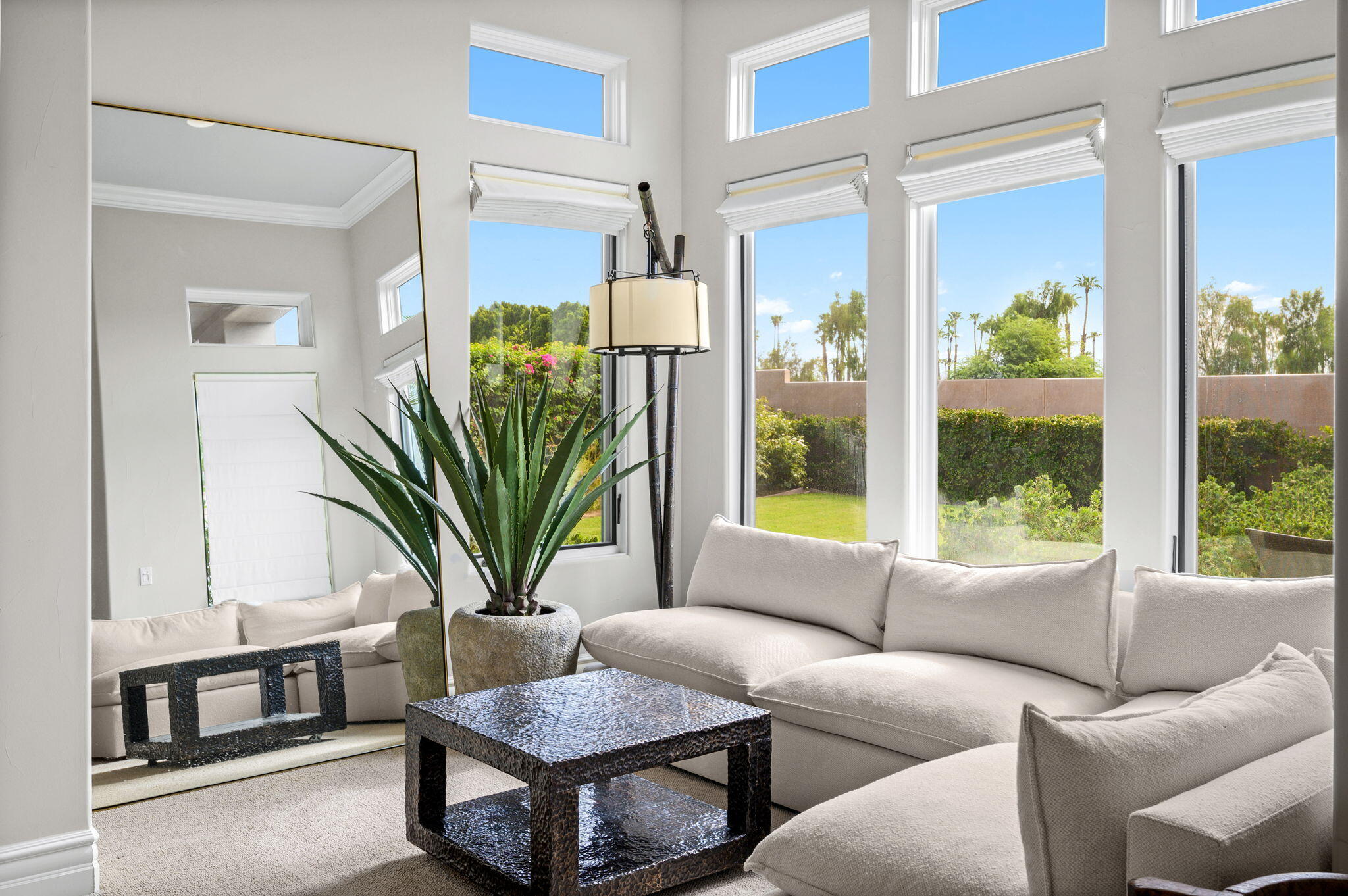 54360 Alysheba Drive La Quinta, CA 92253 - Photo 27 of 68 a living room with furniture flowerpot and wooden floor