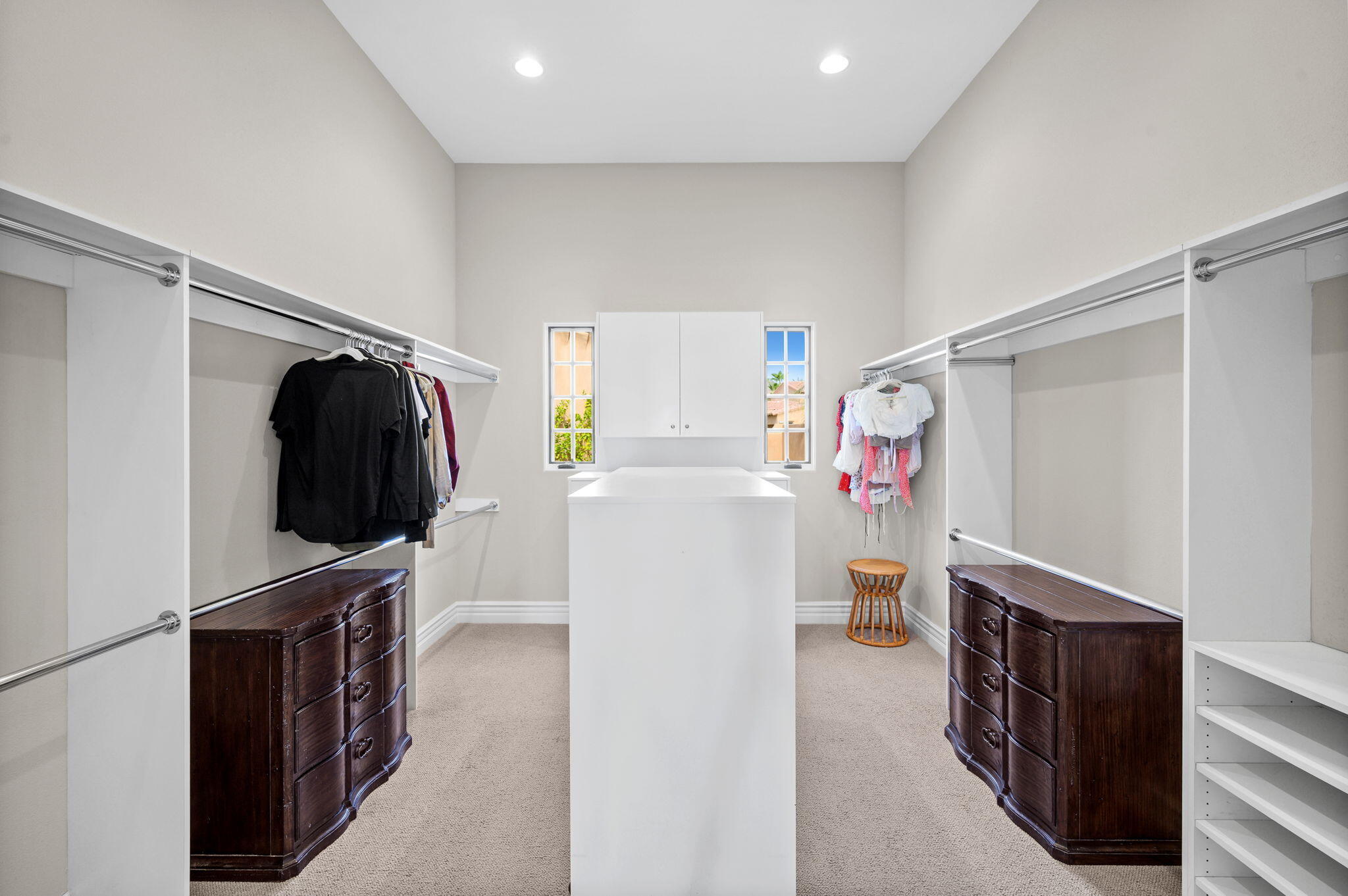 54360 Alysheba Drive La Quinta, CA 92253 - Photo 34 of 68 a view of walk in closet with clothes and shoes