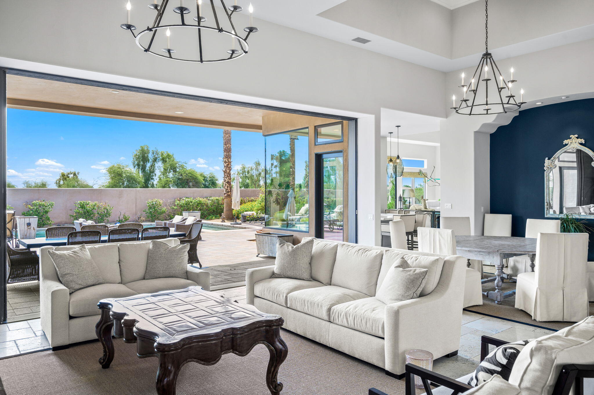 54360 Alysheba Drive La Quinta, CA 92253 - Photo 5 of 68 a living room with furniture and a chandelier
