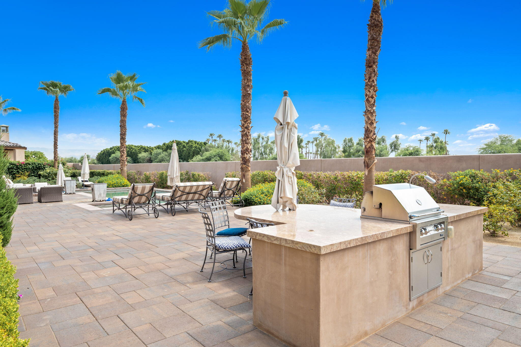 54360 Alysheba Drive La Quinta, CA 92253 - Photo 55 of 68 a view of a patio with swimming pool