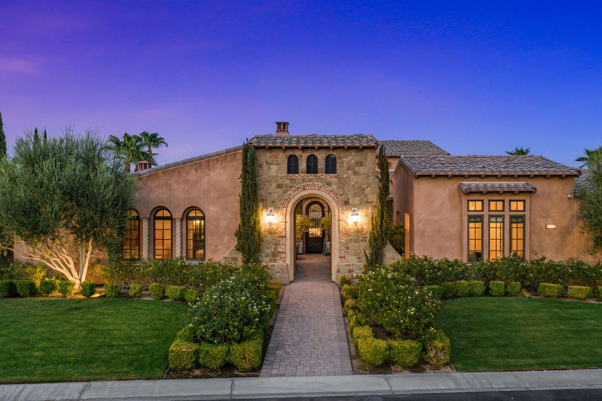 54360 Alysheba Drive La Quinta, CA 92253 - Photo 64 of 68 a front view of a house with a yard