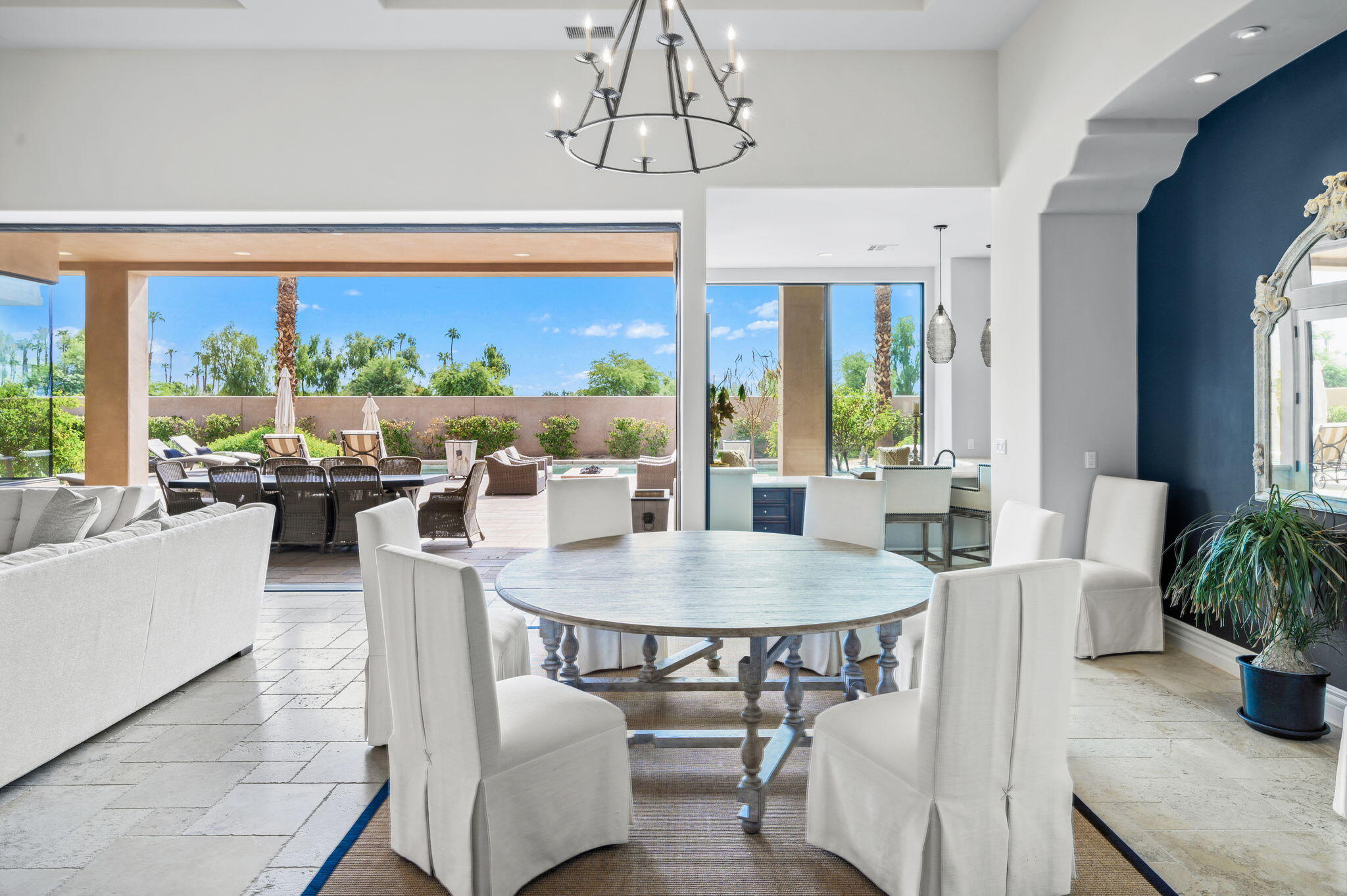 54360 Alysheba Drive La Quinta, CA 92253 - Photo 7 of 68 a view of a dining room with furniture window and outside view