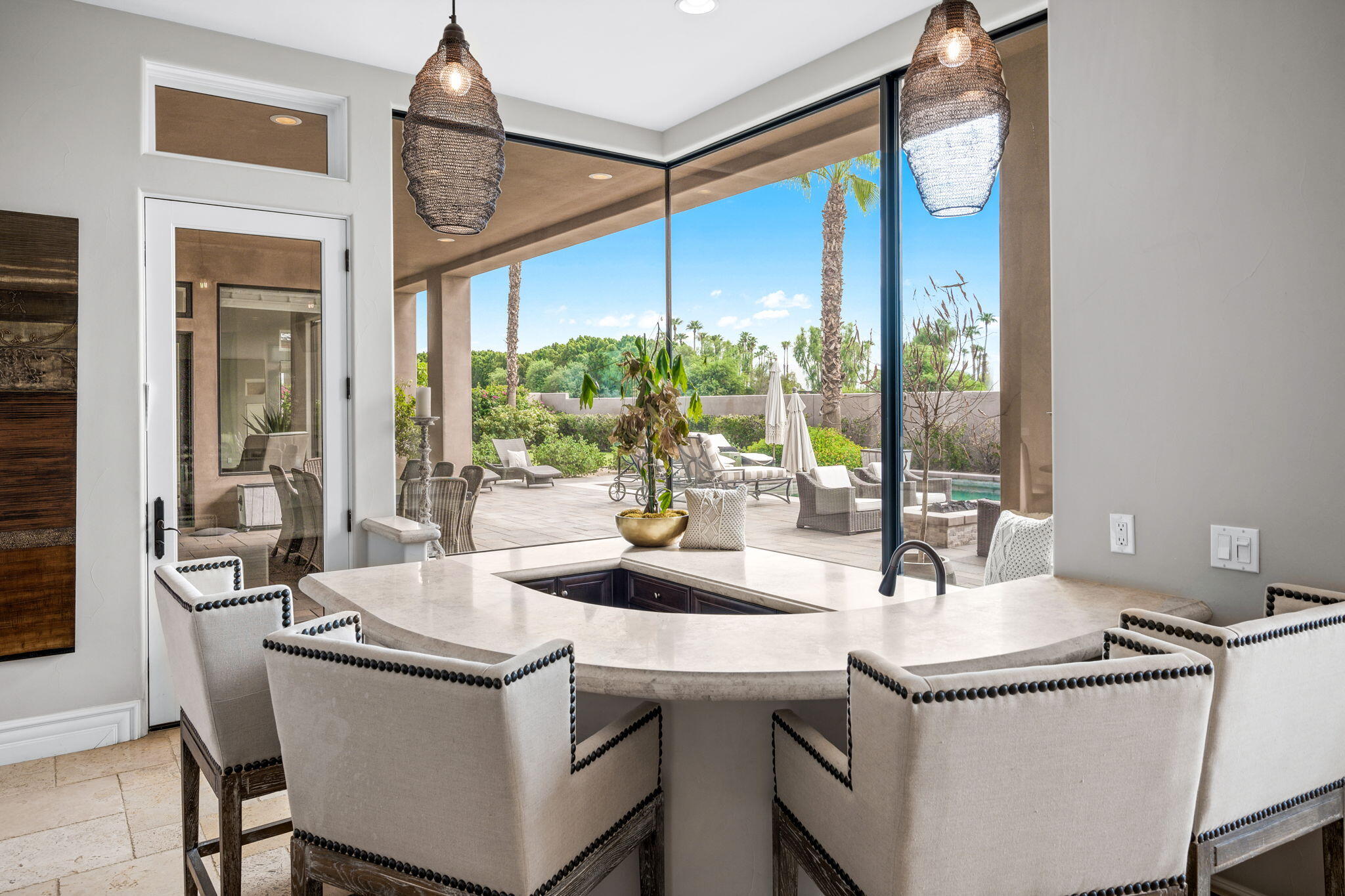 54360 Alysheba Drive La Quinta, CA 92253 - Photo 10 of 68 a kitchen with a sink and a refrigerator