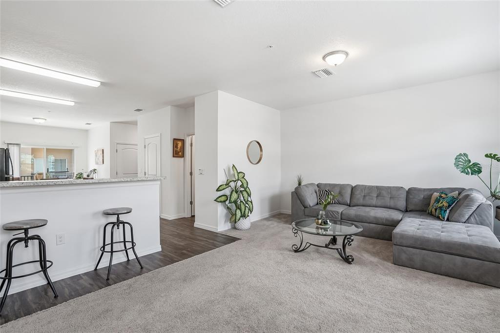 5523 Yellowfin Court New Port Richey, FL 34652 - Photo 28 of 58 a living room with furniture and wooden floor