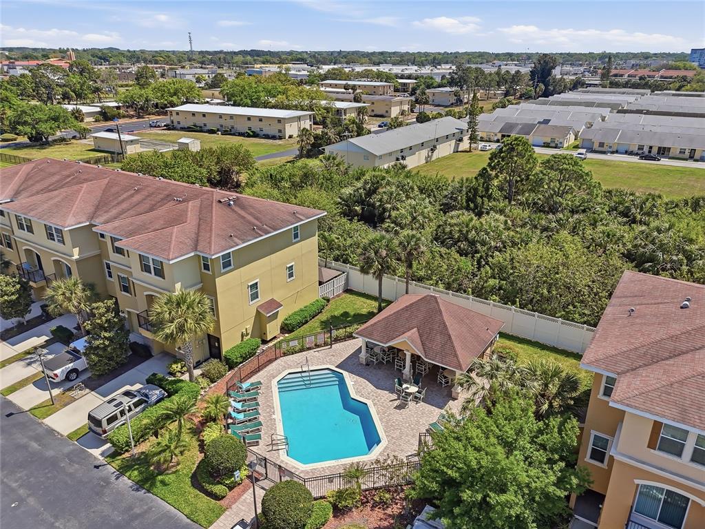 5523 Yellowfin Court New Port Richey, FL 34652 - Photo 44 of 58 an aerial view of house with yard swimming pool and ocean view