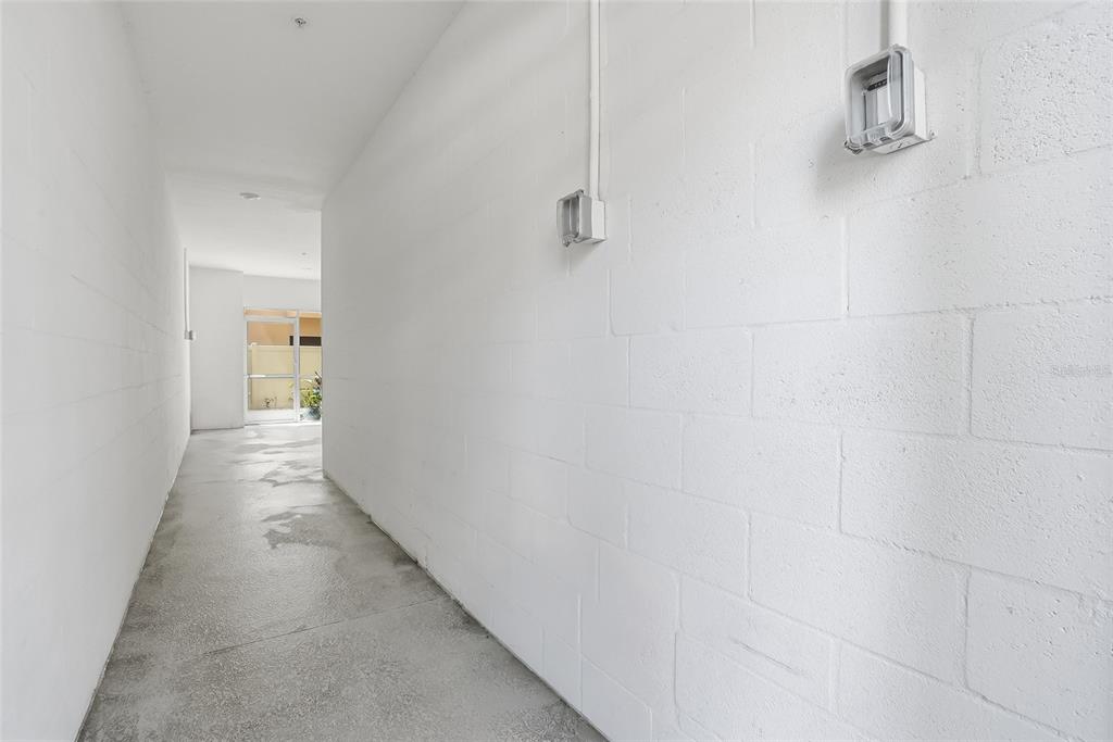 5523 Yellowfin Court New Port Richey, FL 34652 - Photo 5 of 58 a view of a hallway with wooden floor