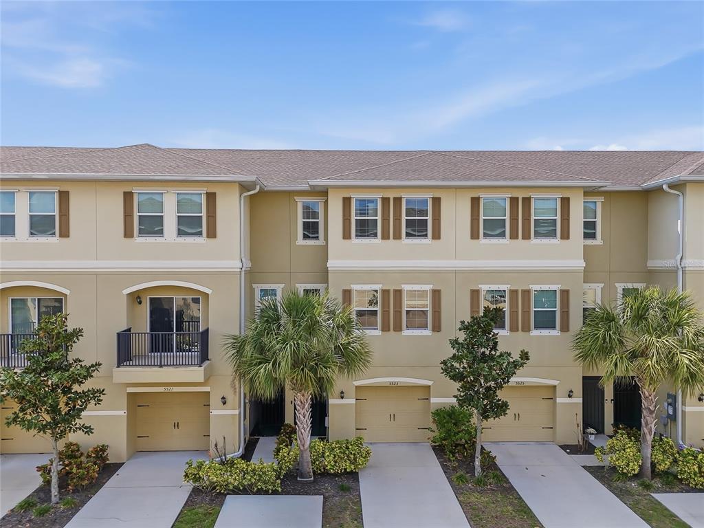 5523 Yellowfin Court New Port Richey, FL 34652 - Photo 53 of 58 a front view of a house with a yard