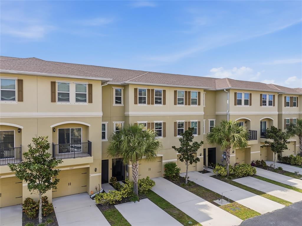5523 Yellowfin Court New Port Richey, FL 34652 - Photo 54 of 58 a front view of a house with yard