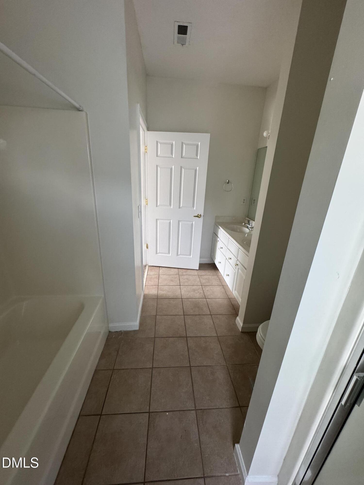 2501 Huntscroft Lane, Unit 201 Raleigh, NC 27617 - Photo 18 of 19 a view of an empty room