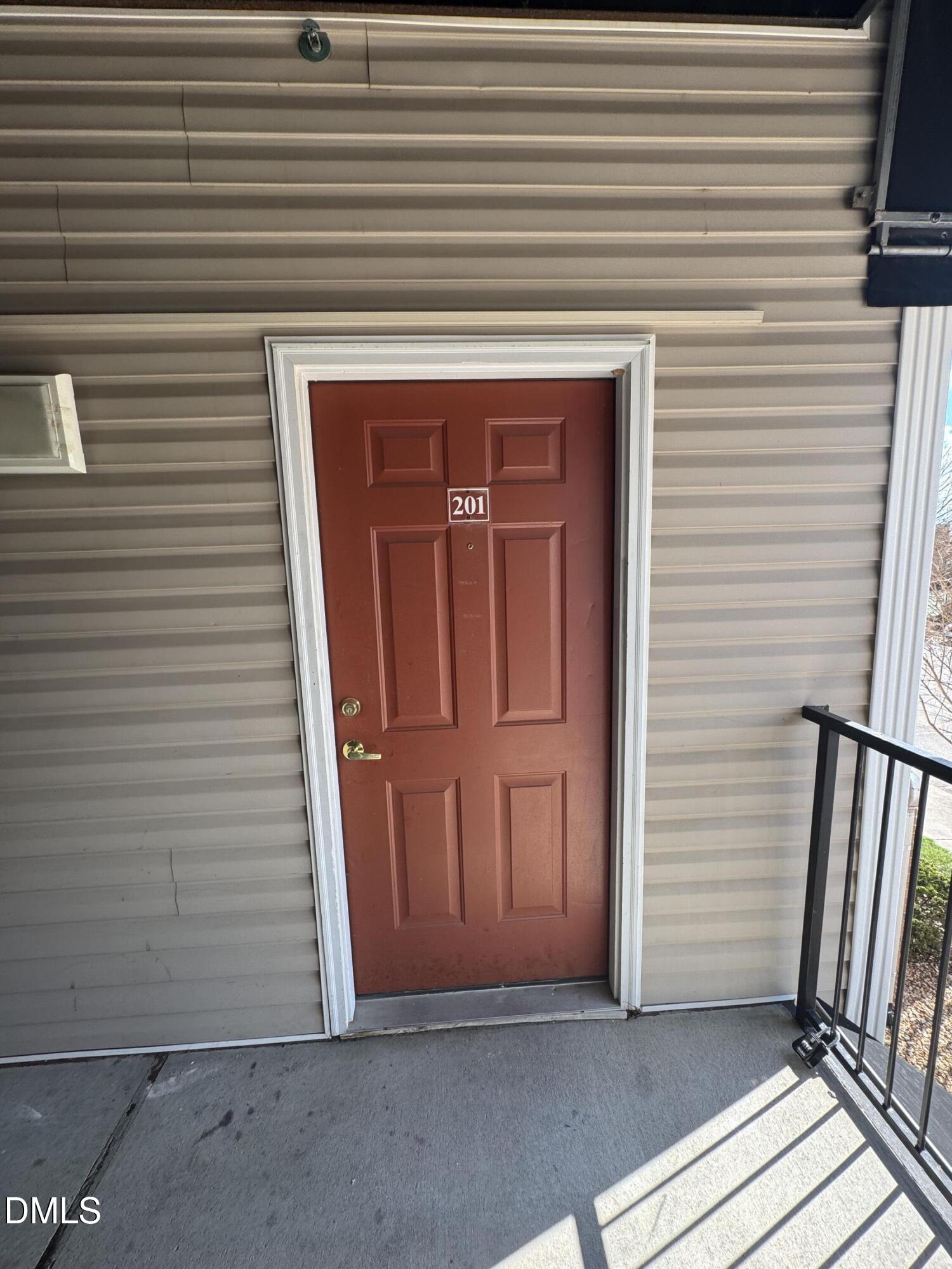 2501 Huntscroft Lane, Unit 201 Raleigh, NC 27617 - Photo 2 of 19 a view of front door of house