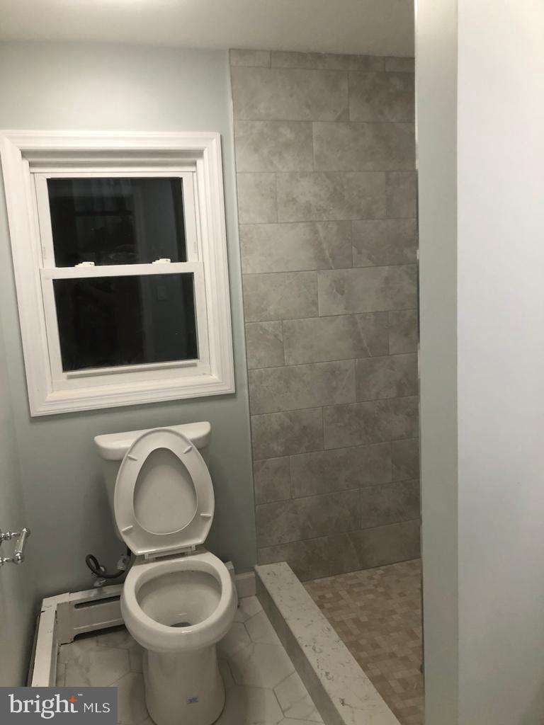 3250 Broad Hamilton, NJ 08610 - Photo 11 of 43 a bathroom with a toilet and a sink