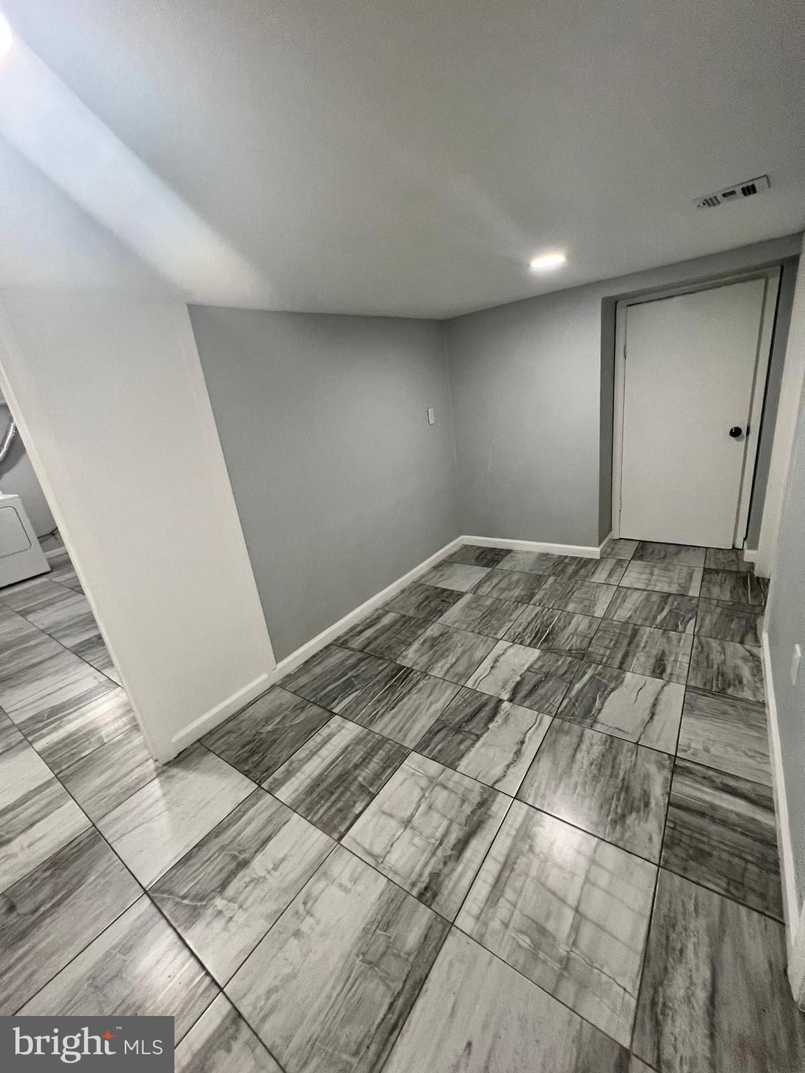 3250 Broad Hamilton, NJ 08610 - Photo 21 of 43 a view of a big room with wooden floor and staircase