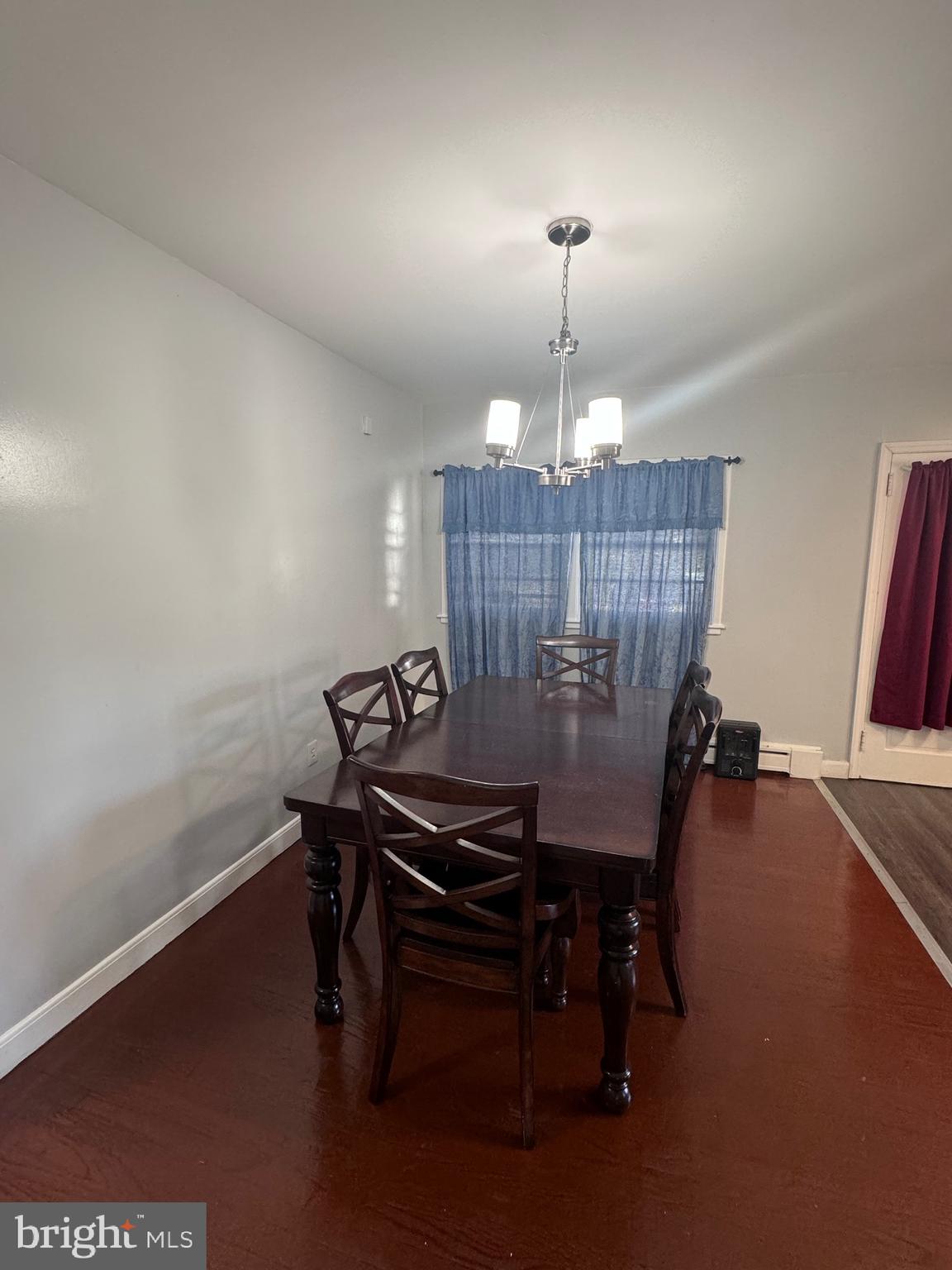 3250 Broad Hamilton, NJ 08610 - Photo 25 of 43 a view of a dining room with furniture wooden floor and chandelier